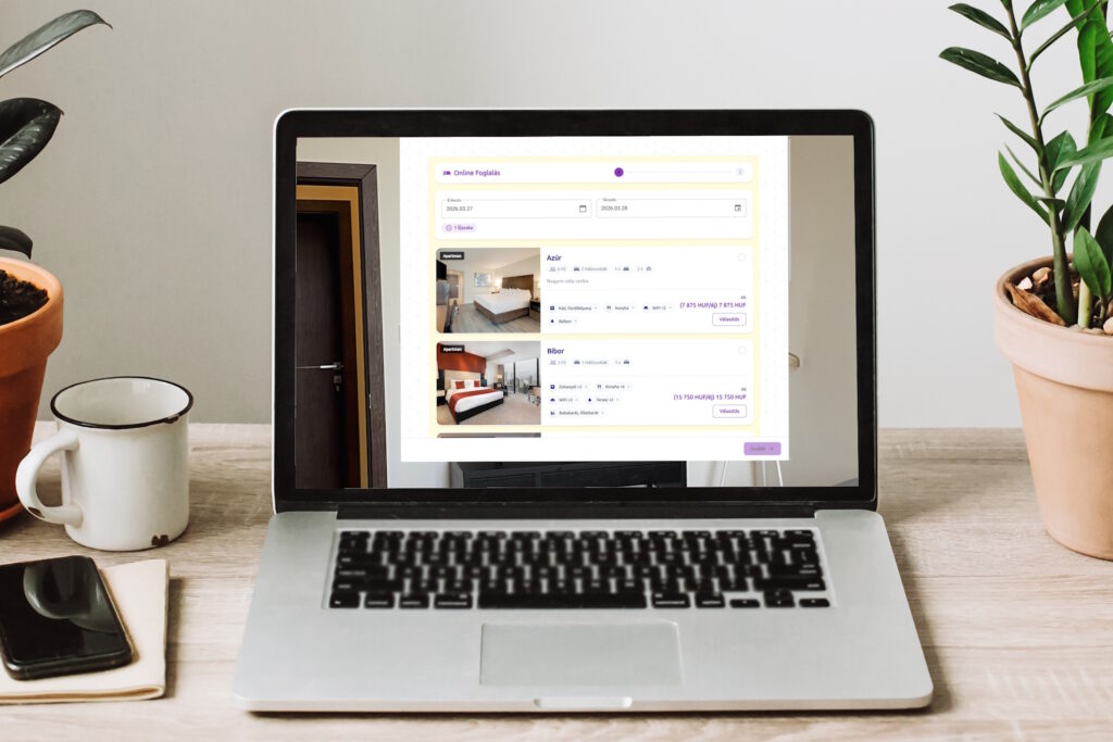 Freelance concept. Laptop with empty screen on wooden desktop with phone, notebook, coffee and plant. space for text. mock-up. business workspace in home or office